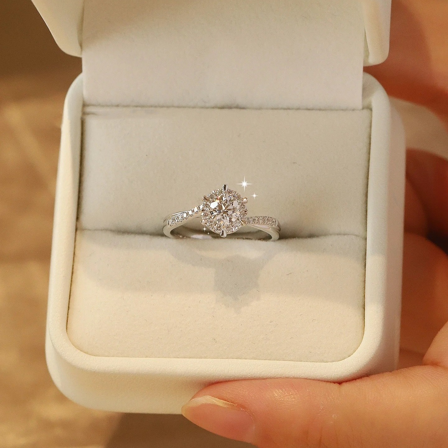 Twisted Band Solitaire Ring in Platinum Tone