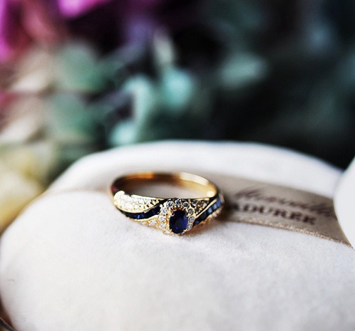 Sapphire Wing Heirloom 18K Gold Vintage Halo Sapphire Diamond Ring Timeless Elegance at Your Fingertips