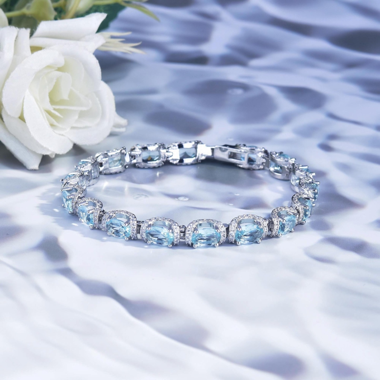 Ocean Blue Elegance 18K White Gold Aquamarine Halo Diamond Bracelet