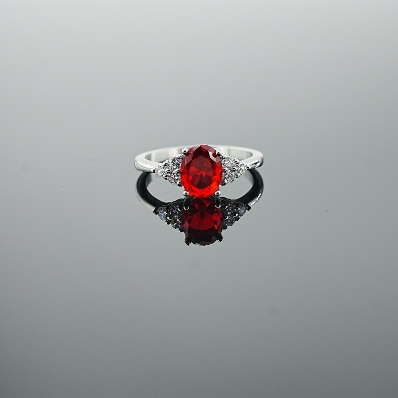 Classic Oval-Cut Colored Gemstone Ring | Elegant Three-Stone Design