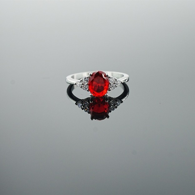 Classic Oval-Cut Colored Gemstone Ring | Elegant Three-Stone Design