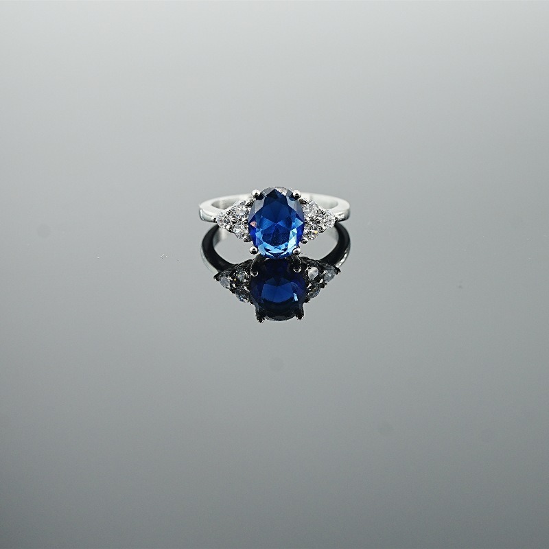 Classic Oval-Cut Colored Gemstone Ring | Elegant Three-Stone Design