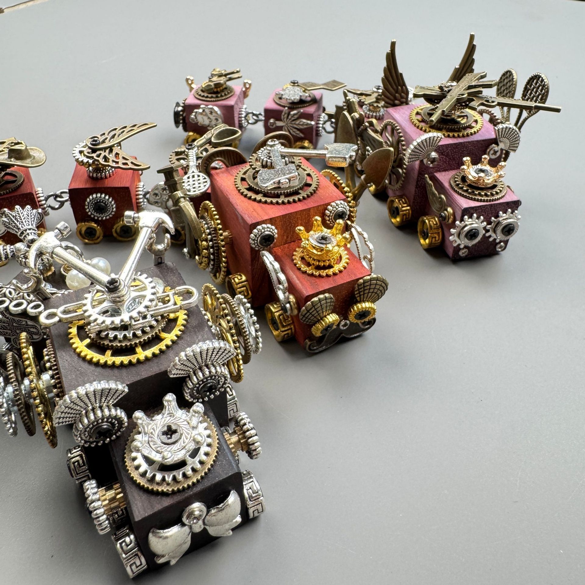 A versatile accessory that works as both a phone charm and a necklace pendant.