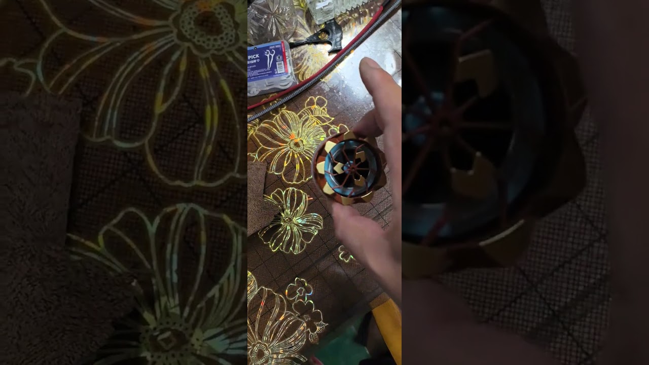 Handheld spinning firework top