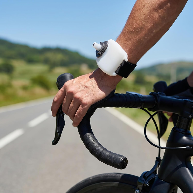 Portable wrist-worn water bottle for outdoor running