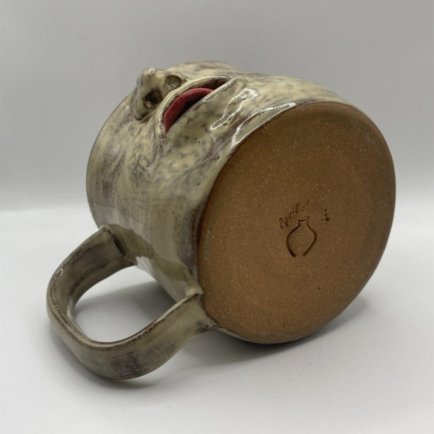 Fun tongue-out ceramic cup