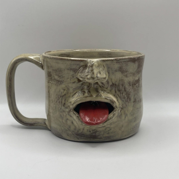 Fun tongue-out ceramic cup