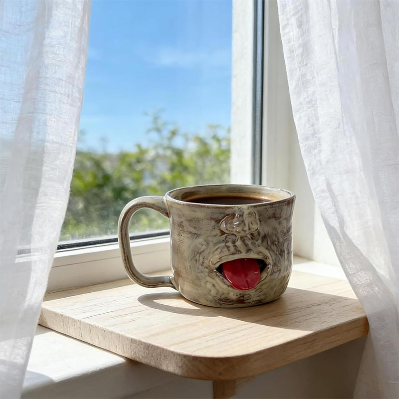 Fun tongue-out ceramic cup