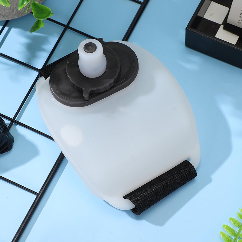 Portable wrist-worn water bottle for outdoor running