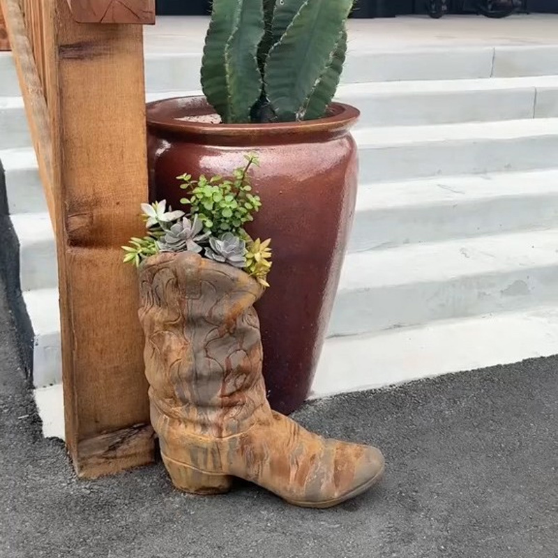Vintage distressed boot-shaped flower pot