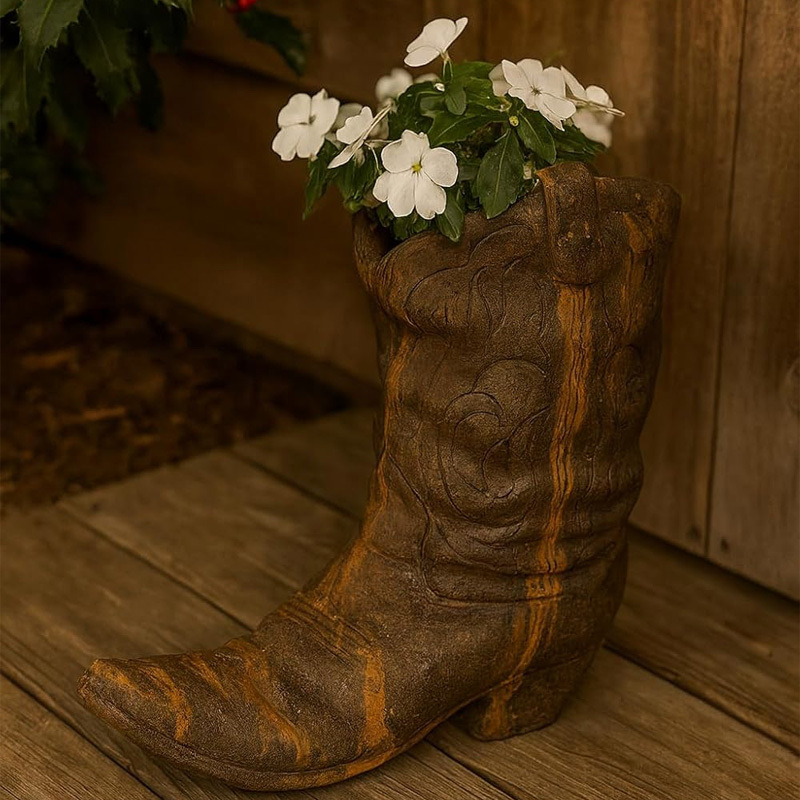 Vintage distressed boot-shaped flower pot