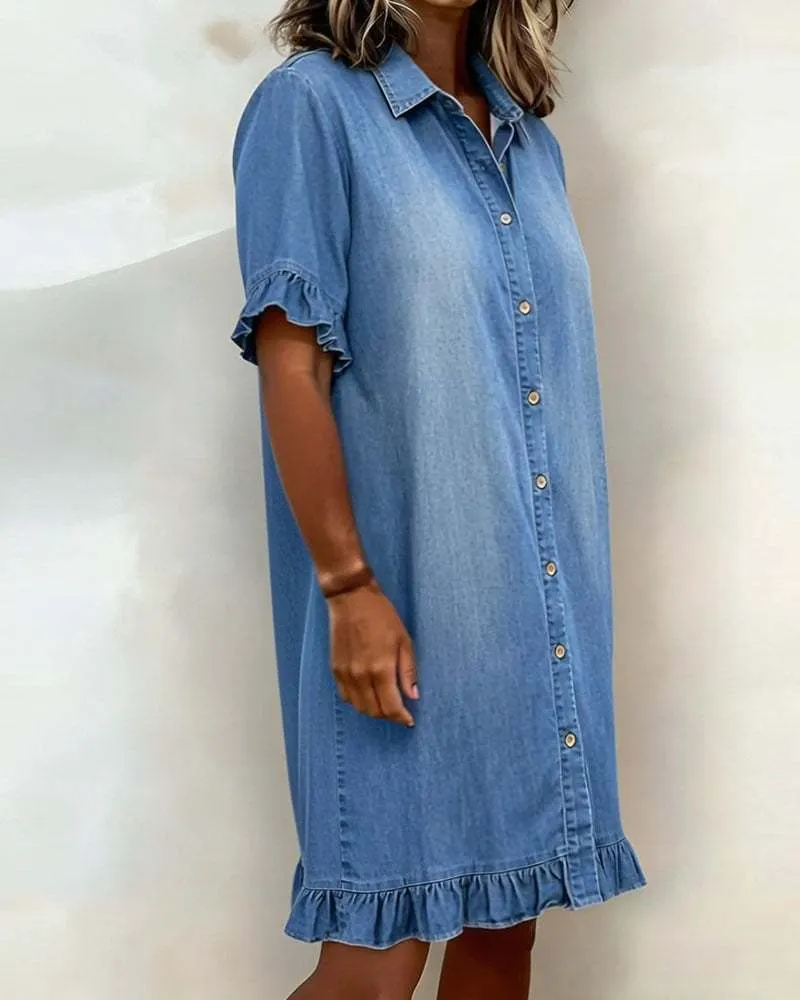Women's faux denim ruffle dress in blue, close-up of ruffle sleeve and patchwork detail
