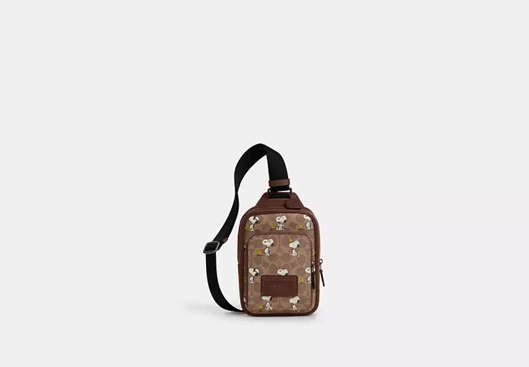 Coach X Peanuts Racer Sling Pack In Signature Canvas With Snoopy Print