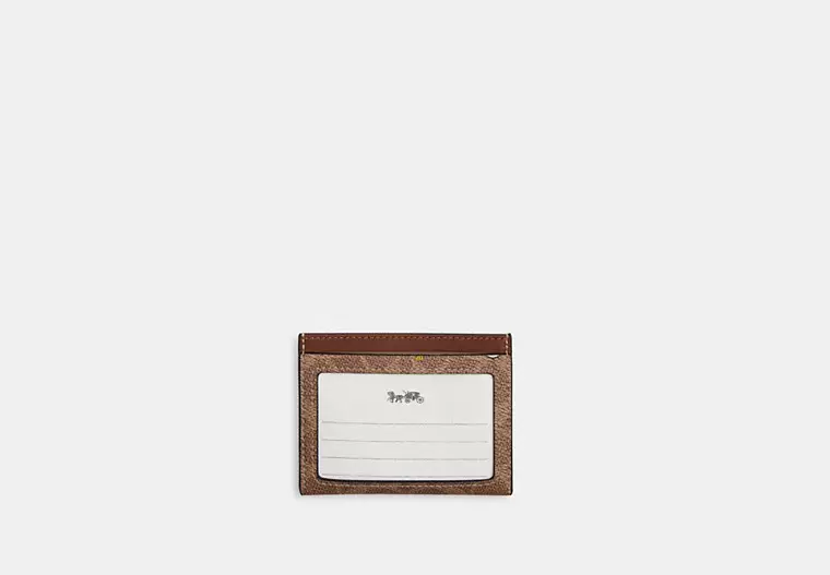 Coach X Peanuts Slim Id Card Case In Signature Canvas With Snoopy Print