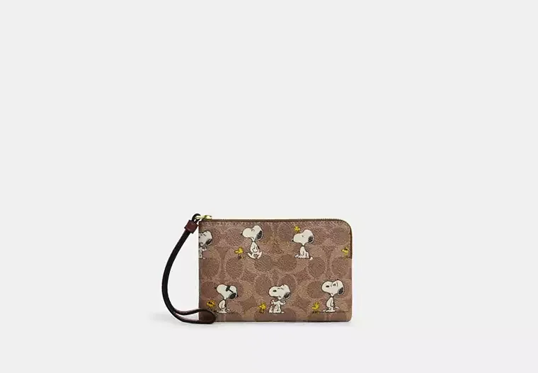 Coach X Peanuts Corner Zip Wristlet In Signature Canvas With Snoopy Print