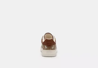 Coach X Peanuts High Line Sneaker In Signature Canvas With Snoopy Print