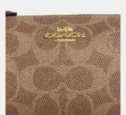 Nolita Barrel Bag In Signature Canvas