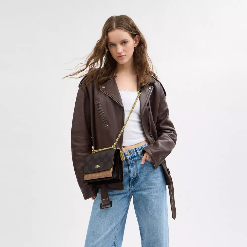 Klare Crossbody Bag In Blocked Signature Canvas