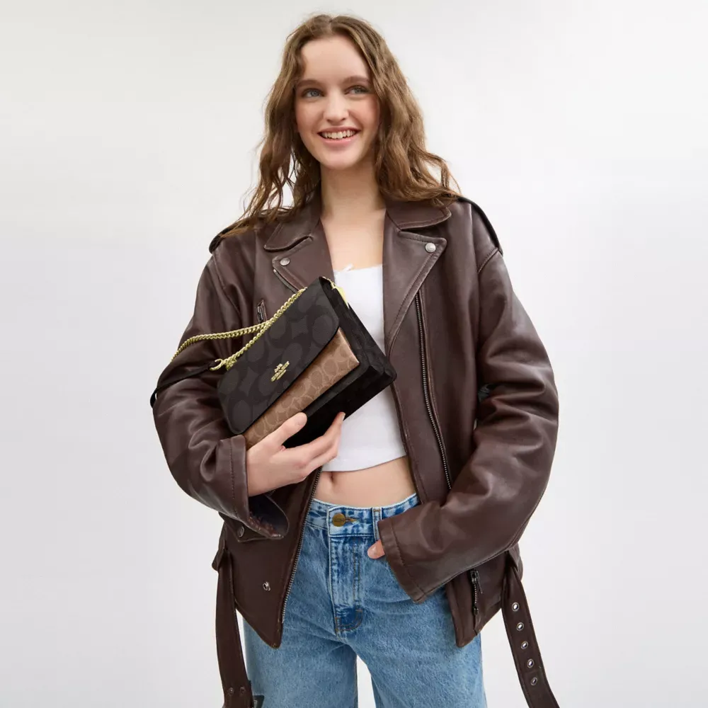 Klare Crossbody Bag In Blocked Signature Canvas