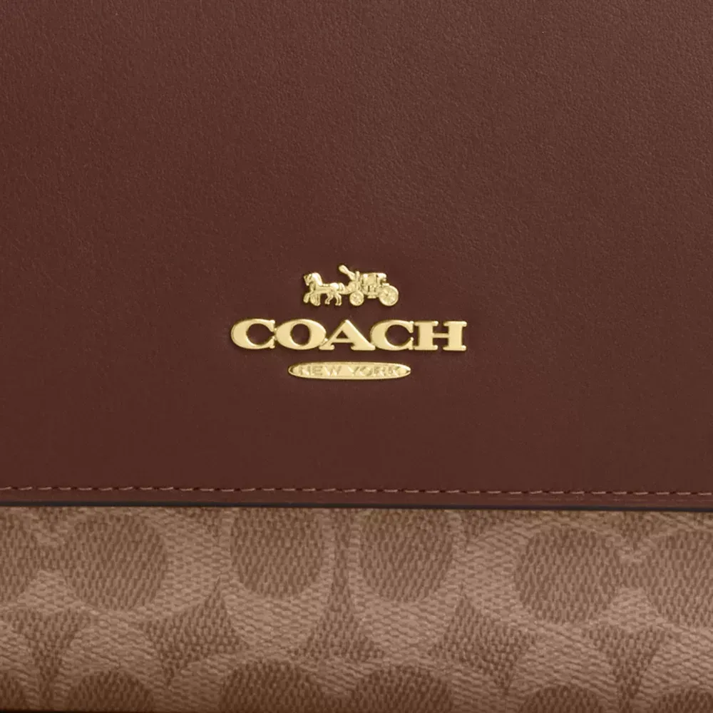  Klare Top Handle Bag In Signature Canvas