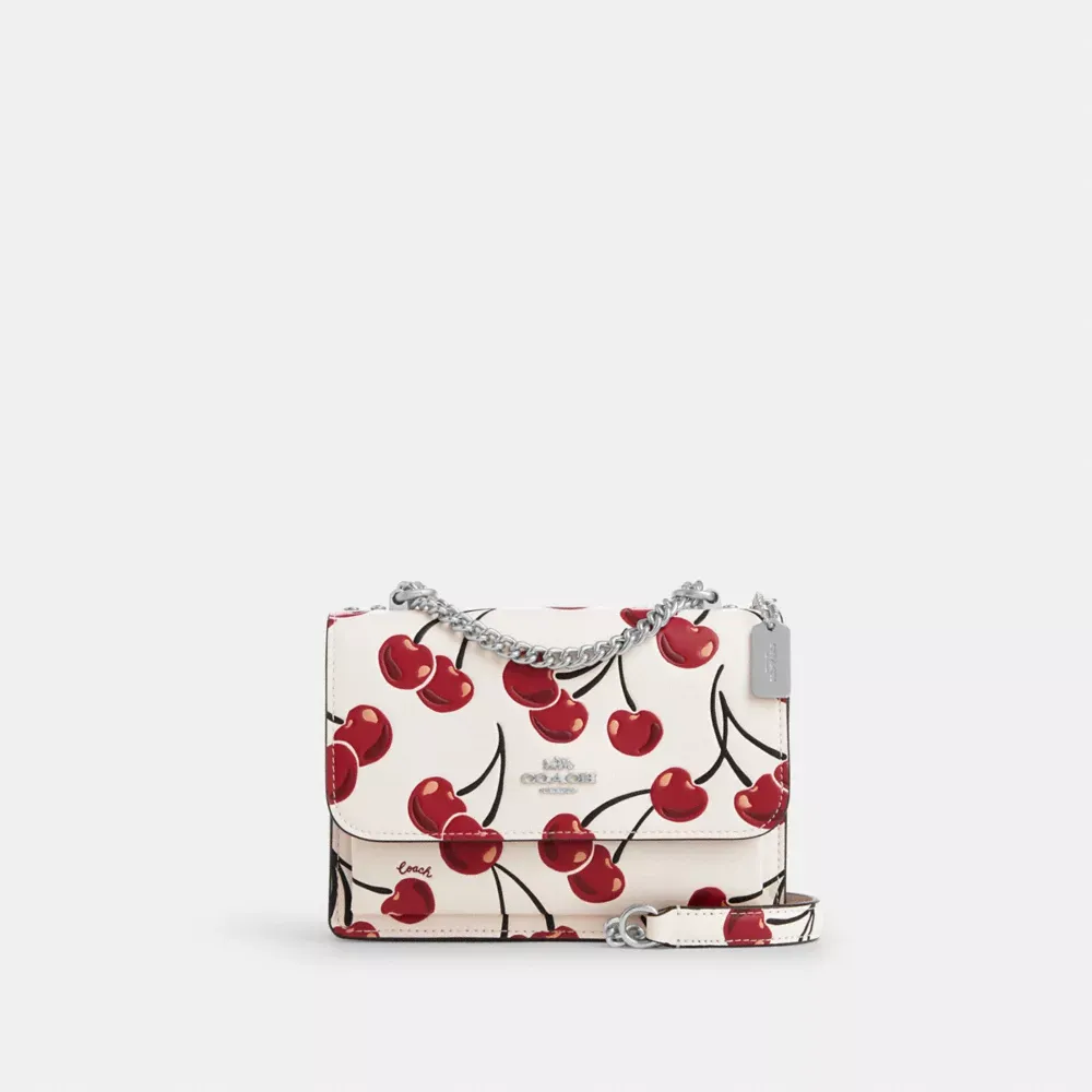 Mini Klare Crossbody Bag In Signature Canvas With Cherry Print