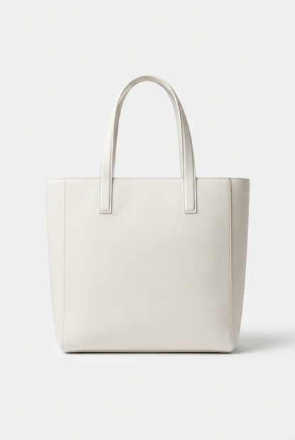 Canvas tote bag standing with handles visible and full shape shown.