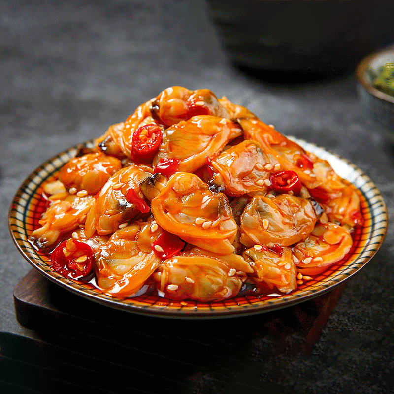 Wild-Caught Deep North Atlantic Scallops 🌊 from an exclusive 25-day golden harvest season! ⏳ Freshly-canned in a zesty Spicy Garlic sauce. 🌶️