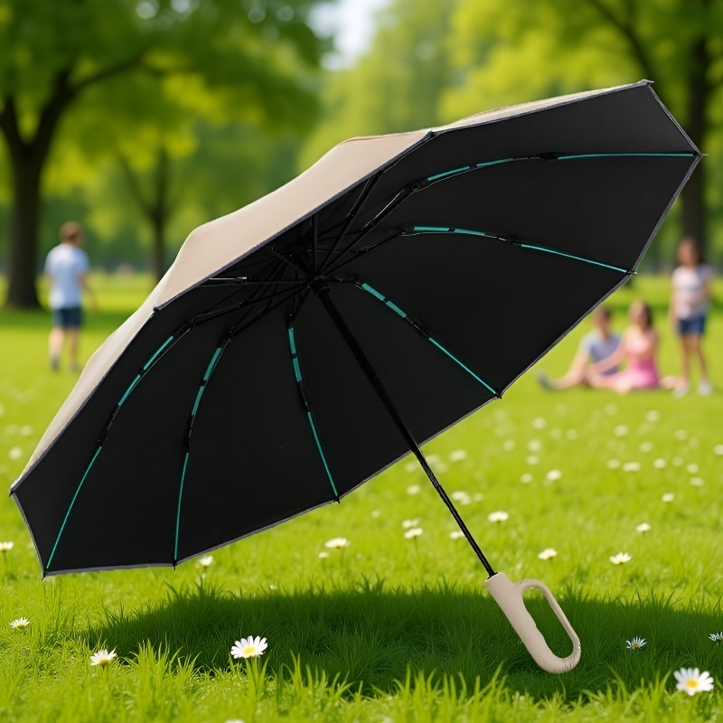 Faltbarer Sonnen- und Regenschirm mit rückseitigem Schnallenverschluss