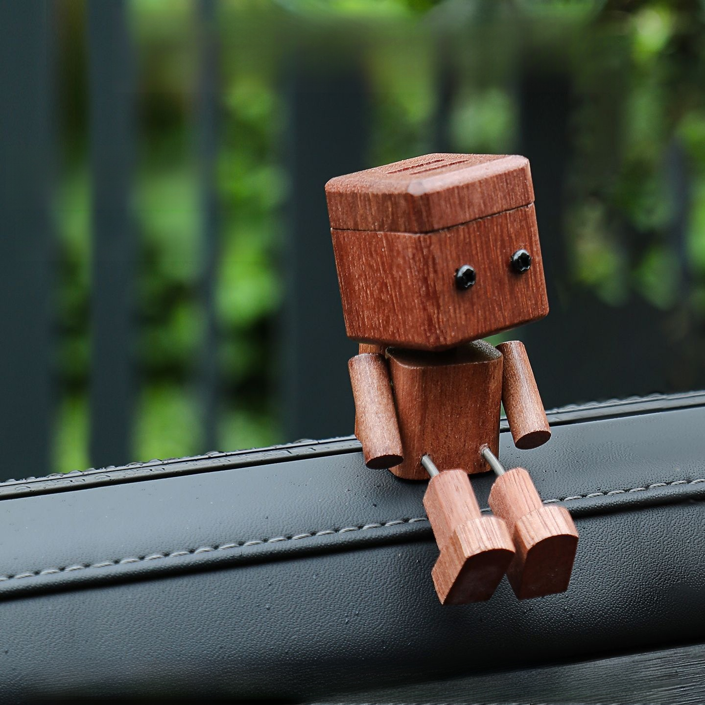 ✨ [Viral On Social Media] ✨ Premium Handcrafted Solid Wood Car Aromatherapy Robot with swinging legs and premium forest scent for the ultimate cute and stress-free driving vibe 🚗