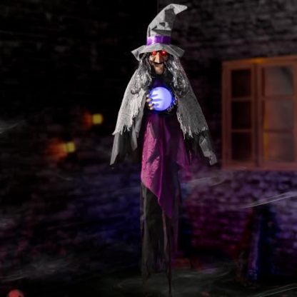 Halloween electronic animated decoration, hanging talking witch, animated witch with sound and motion activation, scary sound effects, glowing crystal ball and eyes, suitable for indoor and outdoor haunted house props.