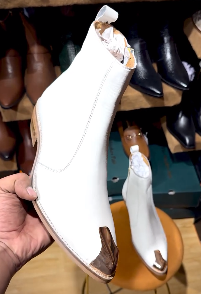 Handcrafted metal-toed white ankle boots