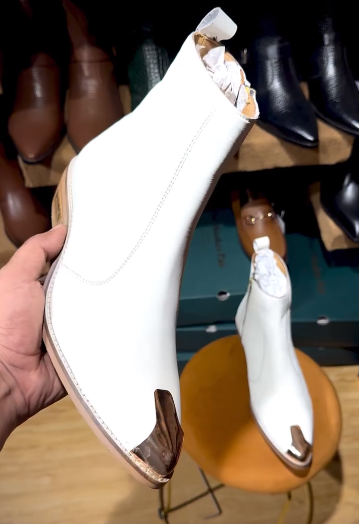 Handcrafted metal-toed white ankle boots