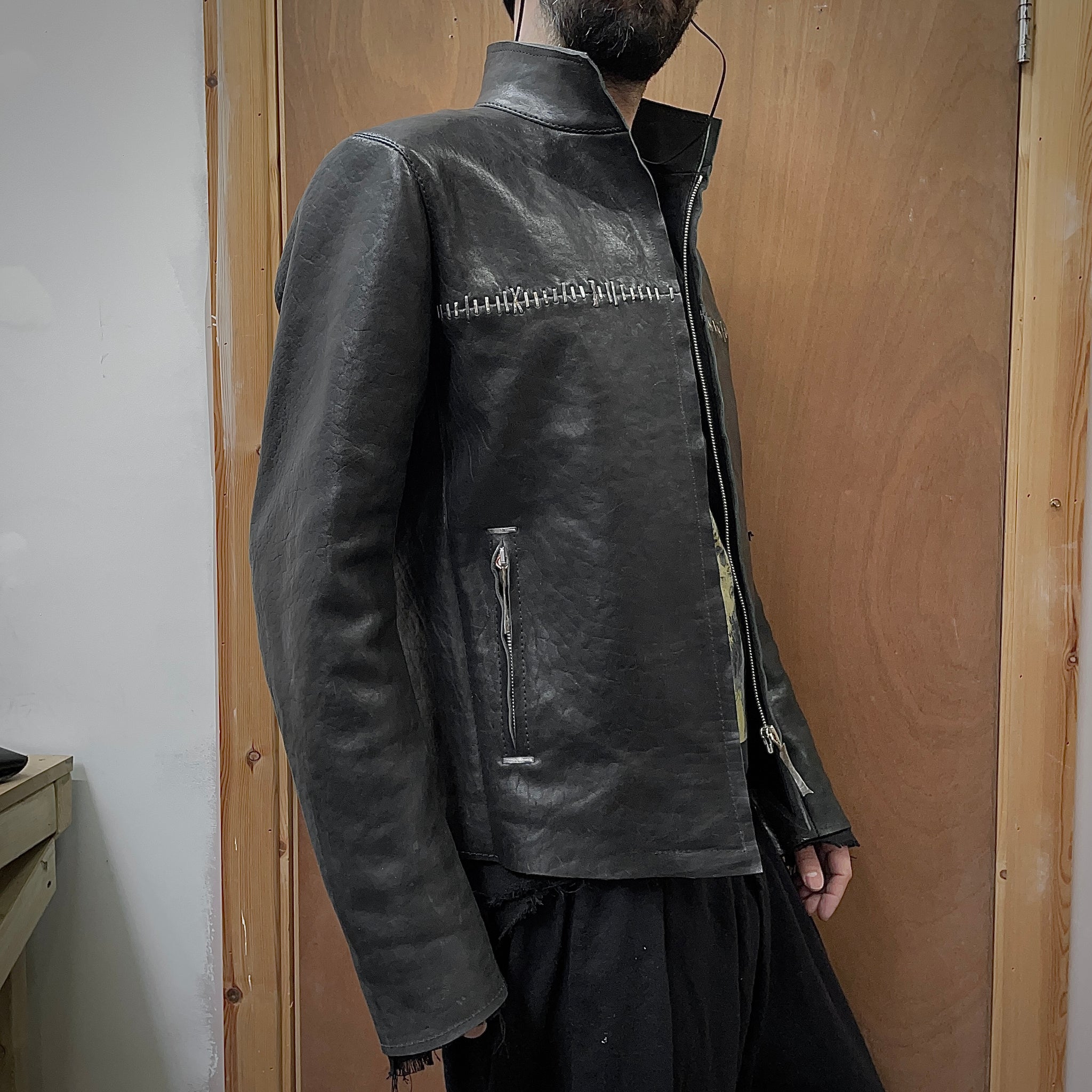 Hand-stapled leather jacket