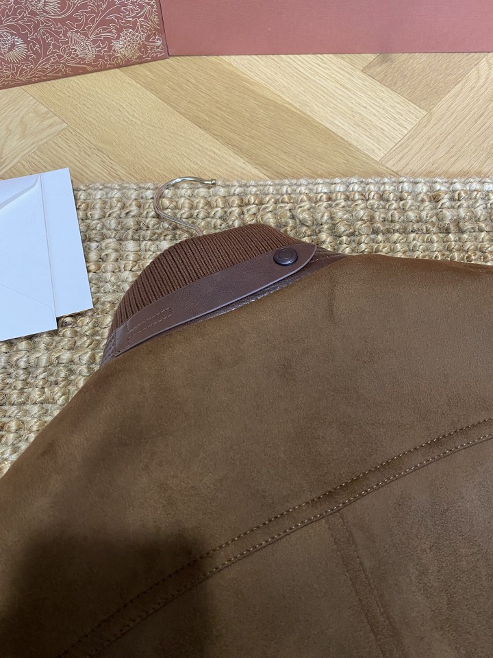 Suede-trimmed knit stand-collar jacket