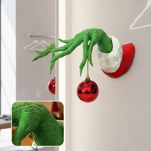 Green monster hand Christmas wall decoration with detailed texture