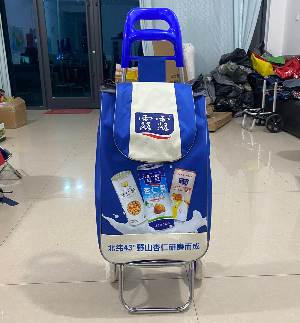 Strongbird custom logo utility cart, custom folding shopping cart customized as branded promotional merchandise for food and beverage company, blue foldable trolley printed with drink product advertisement pattern