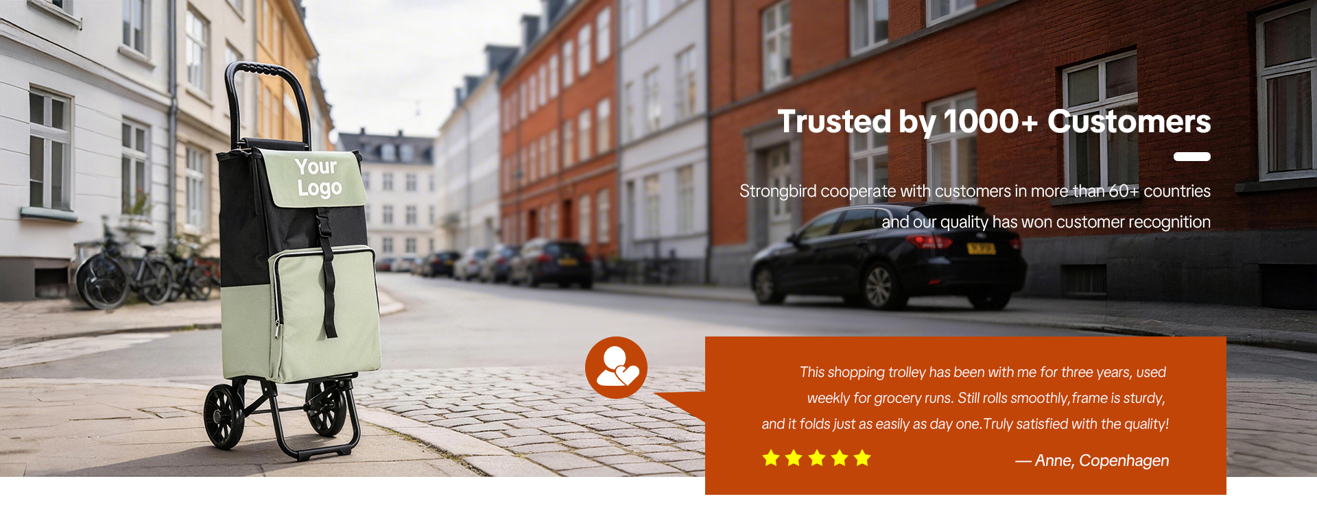 {"default":"Folding shopping trolley with customizable logo, shown outdoors on a street, accompanied by customer review and 5-star rating"}
