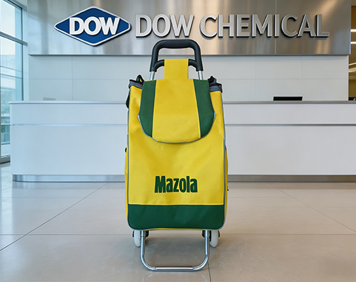{"default":"Yellow and green Mazola branded shopping cart displayed in front of Dow Chemical reception"}
