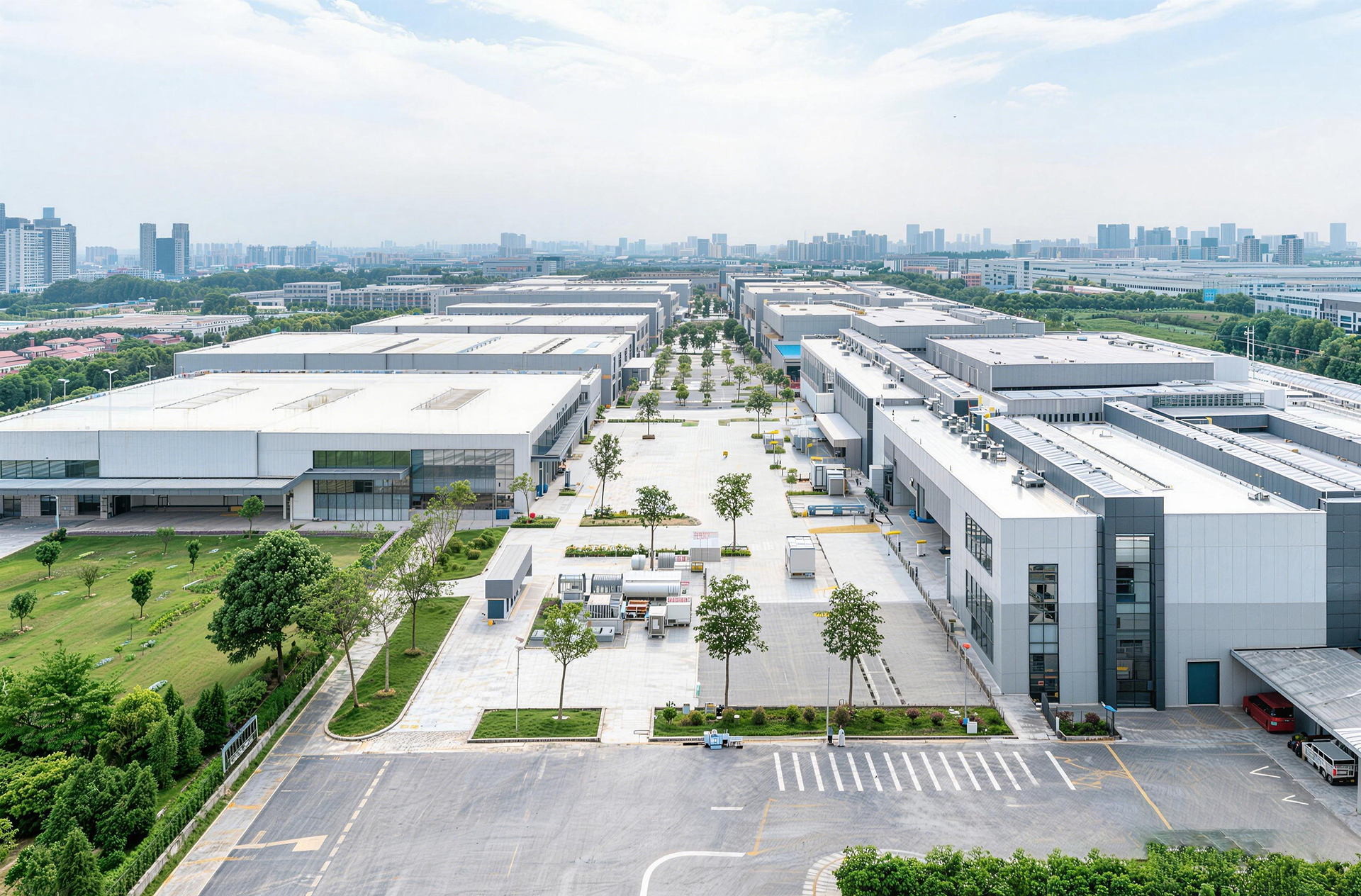 Aerial view of factory plant belonging to Shopping Cart Manufacturers, with tidy workshops and logistics zones for mass production of shopping carts.