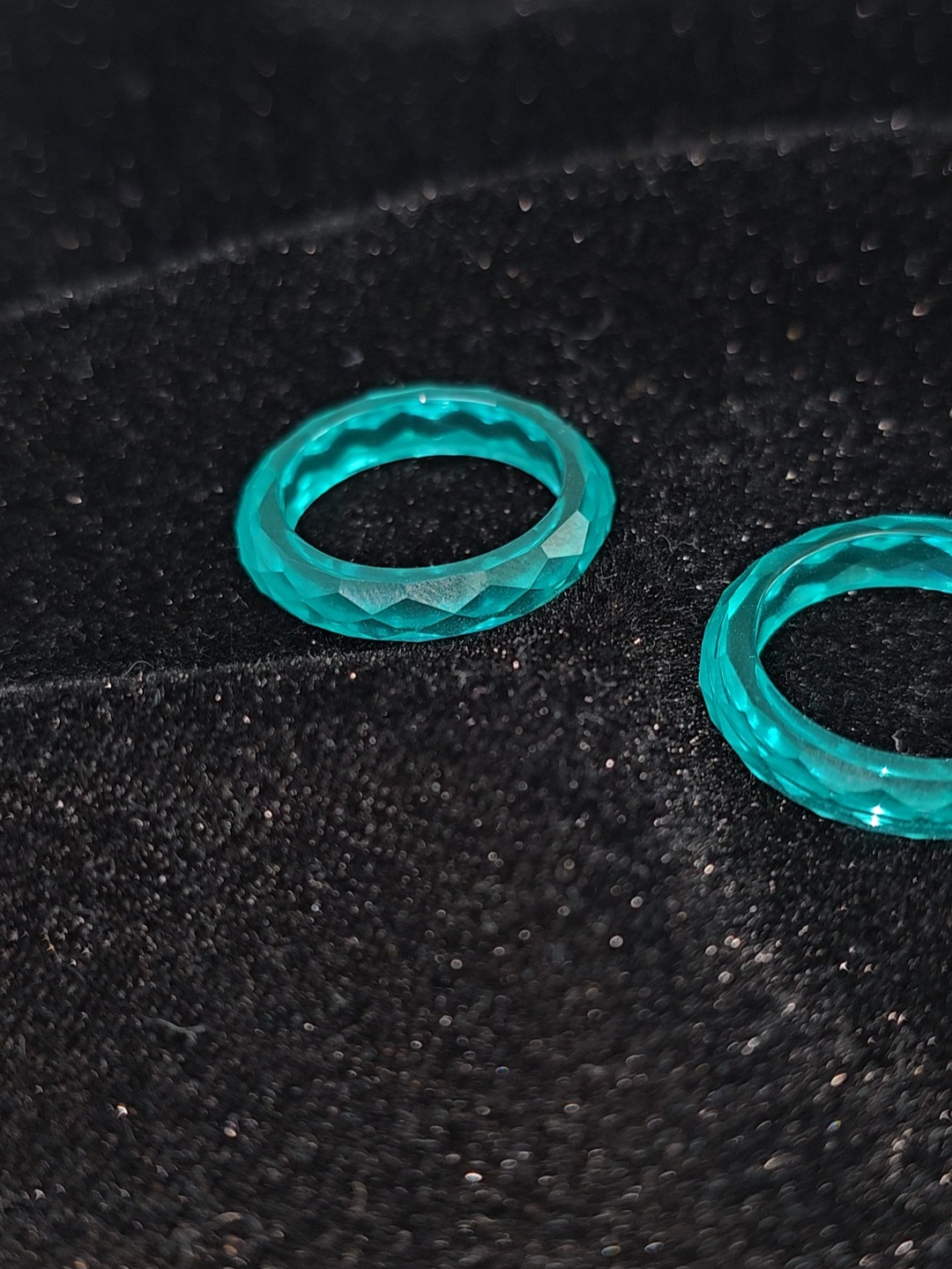 Paraiba YAG faceted solitaire ring.