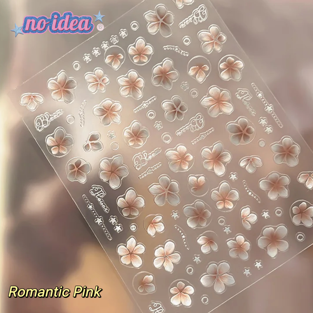 One DIY nail decals set showing romantic five-petal flower design in light pink.