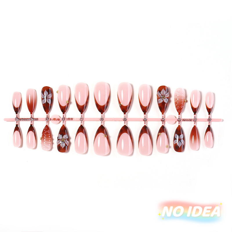 Almond shaped nails with a wine red French tip and delicate white waterdrop flower designs.