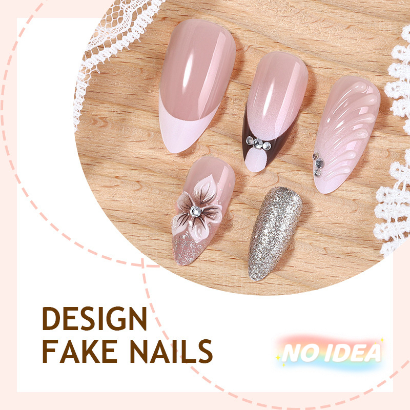 Almond shaped nails with a nude/white French tip and metallic pearl & seashell embellishments.