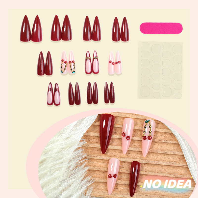 Wine red almond shaped press on nails with bright red cherry prints.
