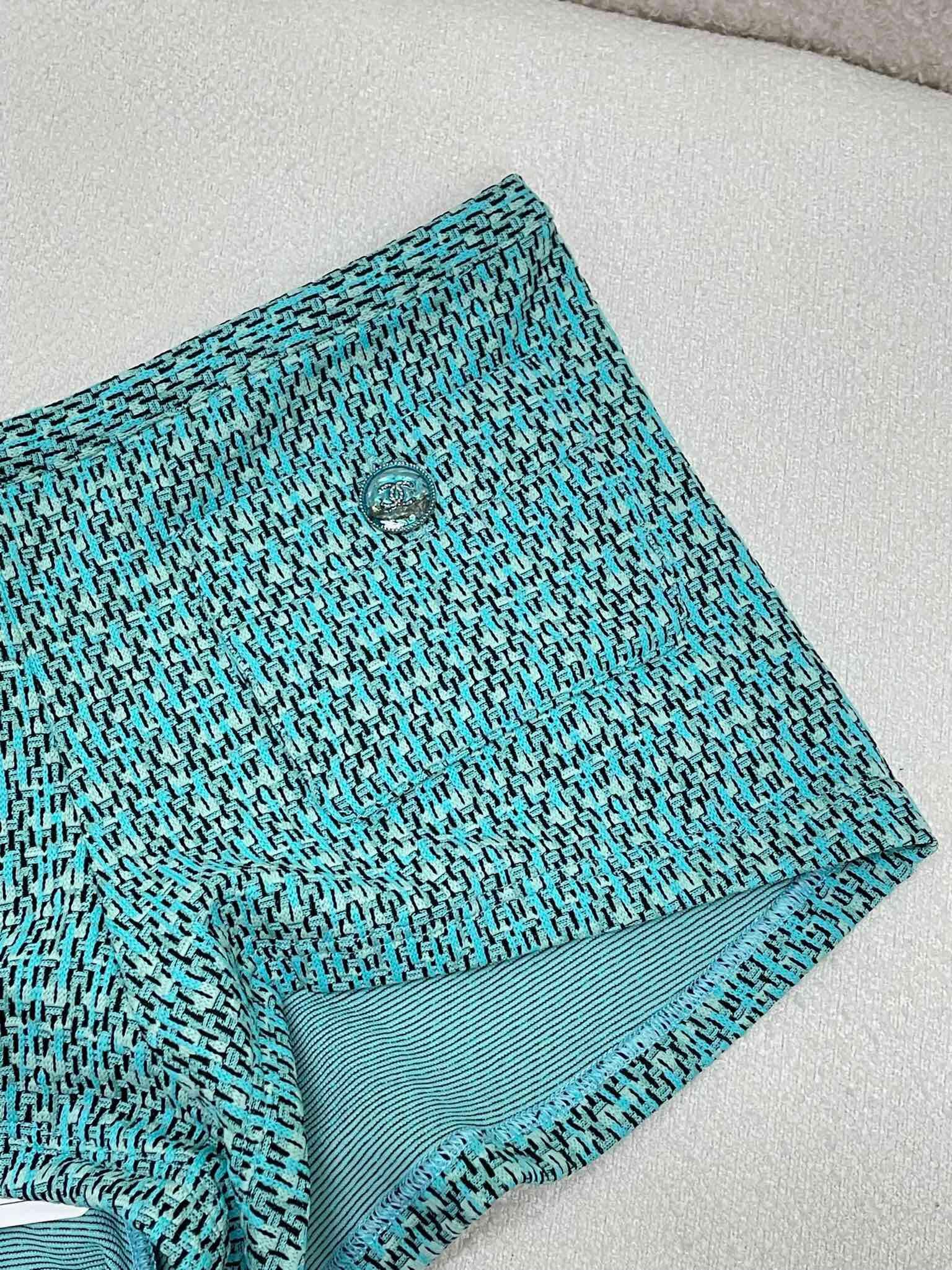 CHNEL green tweed shorts