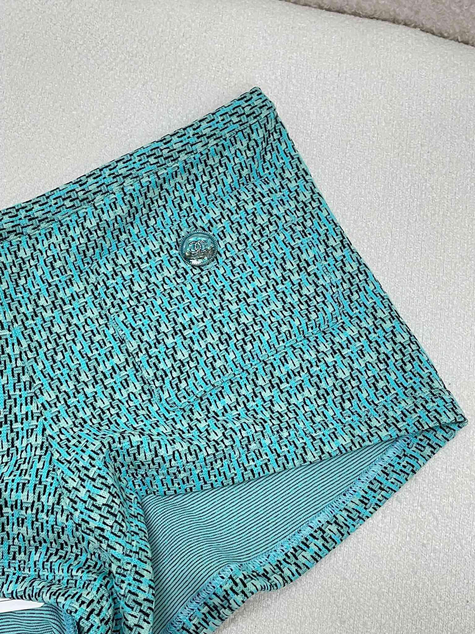 CHNEL green tweed shorts