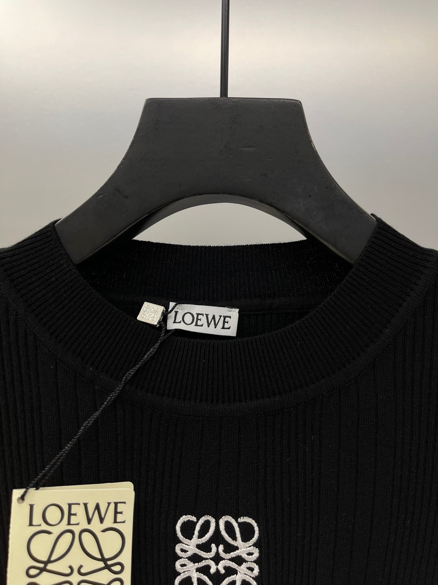 LOE Embroidered Logo Short Sleeve Knit Top