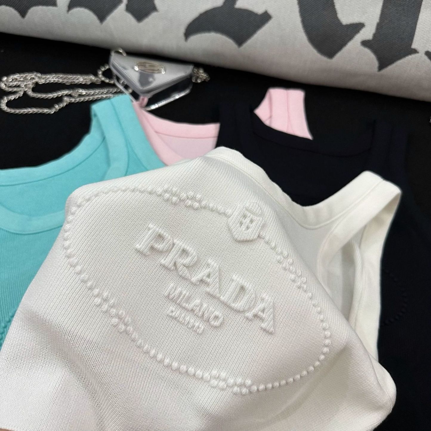 PRAD25SS Solid Color Crew Neck Letter Embossed Knit Tank Top