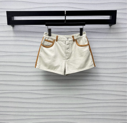 MIU25SS wrap-around patchwork denim shorts