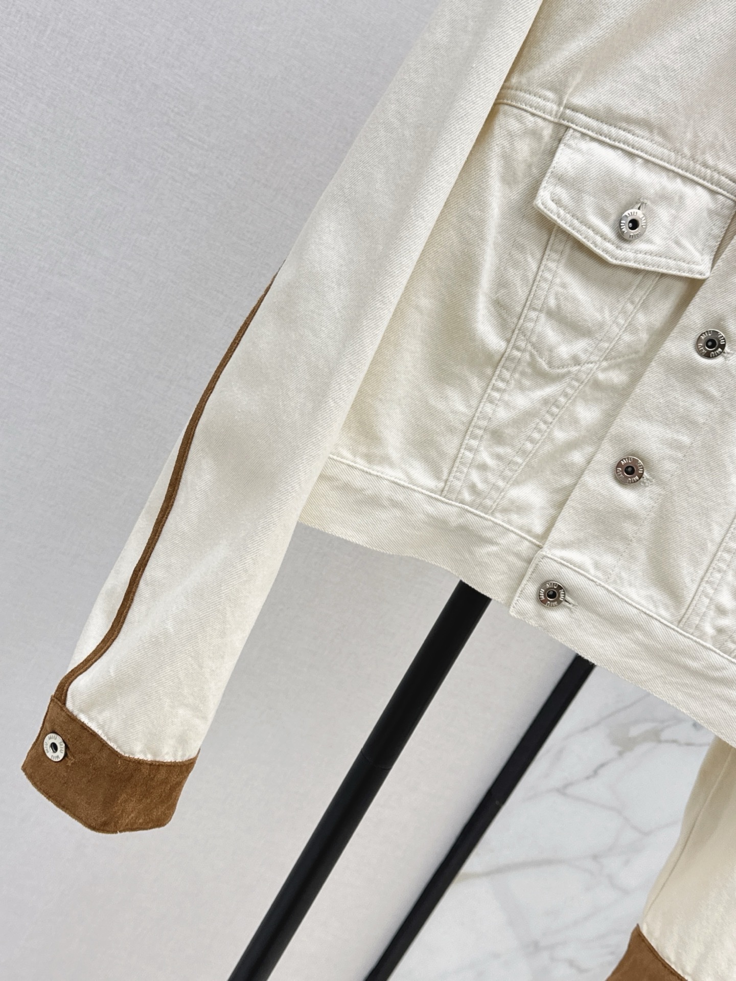 MIU25SS quilted leather trimmed denim jacket